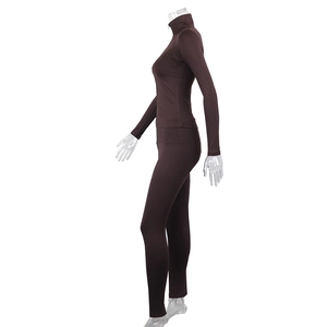 Side view of dark brown sports set with zip-up jacket and high-waist leggings
