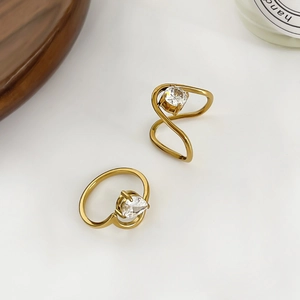 Minimalist 18K gold-plated titanium steel ring set with zircon in a wavy wave design