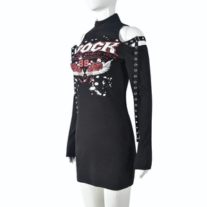 Detail of Rock Music print and metallic eyelet webbing on black off-shoulder knit dress