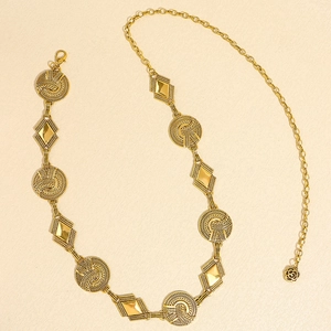 Vintage gold metal waist chain with spiral textured discs and rose pendant for dresses