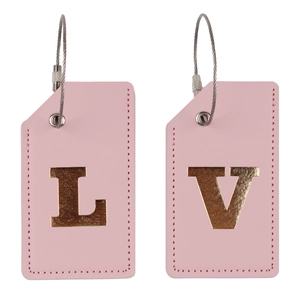 Detailed view of pink PU leather luggage tags with gold metal letters L and V and wire loops