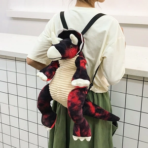 Cute triceratops plush backpack in red and black tie-dye with adjustable straps