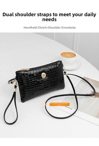 Black crocodile embossed patent leather clutch bag with detachable shoulder straps