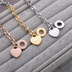 Pendentifs cœur et anneau polis en acier inoxydable sur chaînes or, argent et rose doré