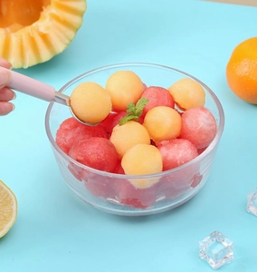 Cuillère parisienne à melon avec manche rose et tête en acier inoxydable poli
