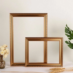 European vintage gold photo frames with exquisite bead carvings in a lifestyle scene