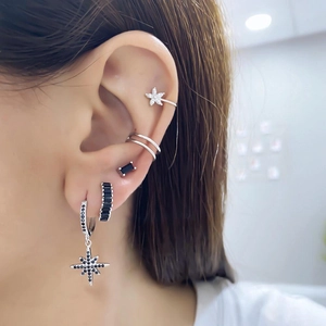 S925 silver earring set featuring colorful cubic zirconia studs and stars on ear model