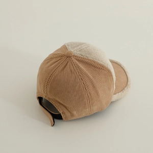 Detail view of khaki corduroy baseball cap with adjustable strap and warm fleece lining