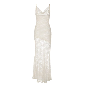 Close-up of white lace bodycon slip dress with intricate floral embroidery details