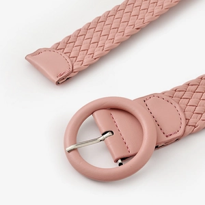Women's pink woven leather belt featuring a matching candy-colored round buckle detail