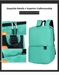 Detail view of mint green backpack featuring reinforced stitching and high-quality metal zippers