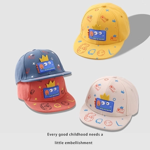 Colorful kids dinosaur baseball caps with cartoon patterns in yellow, blue, and red