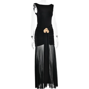 Detail of waist design on black sleeveless dress with gold buckle and pleated texture