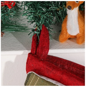 Detail view of the durable felt loop and stitching on the red festive Christmas stocking