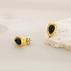 Boucles d'oreilles gouttes en acier doré 18K avec pierre œil de chat noire élégante