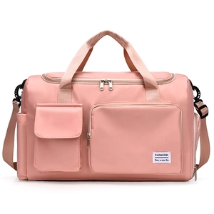 Pink waterproof nylon travel bag with large capacity for gym and sports use