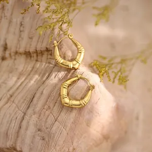 Exquisite 18K gold-plated stainless steel hoop earrings with unique bamboo texture design