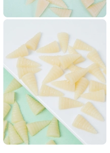 Detailed macro view of spiral cone-shaped yellow resin bamboo shoot food miniatures