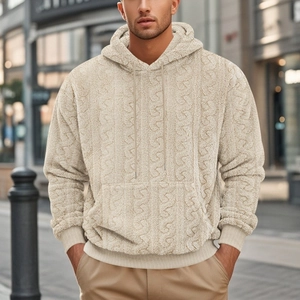 Detailed view of the men's fleece hoodie featuring 3D textured knit and plush fabric