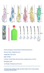 Macro view of DIY feather diamond painting bookmarks with acrylic panels and tool kit