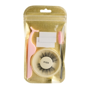 Self-adhesive false eyelashes kit with pink applicator and spoolie brush in gold pouch