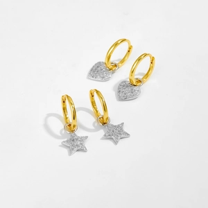 Detailed macro shot of S925 sterling silver hoop earrings with heart and star pendants