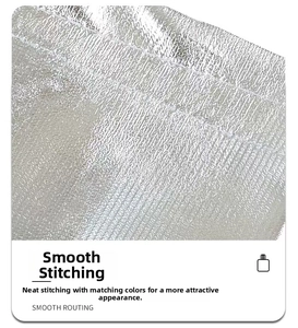 Macro shot of silver metallic drawstring bag showing smooth routing and precise stitching