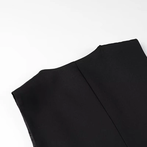Detailed close-up of the back neckline and stitching on the black sleeveless vest suit