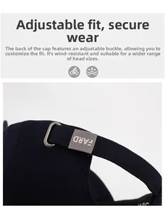 Detail of adjustable metal buckle with FARD engraving on navy twill cotton baseball cap