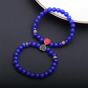 Blue cat eye stone beaded bracelet with heart enamel charms and gold zircon spacers