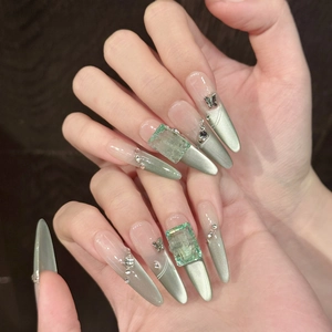 Mint green cat-eye press-on nails with luxury square gemstone and silver butterfly