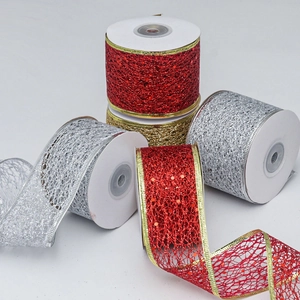 Close-up of sparkling sequin mesh ribbon with metallic wire edges in red gold and silver