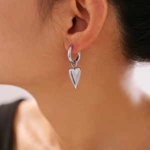 Minimalist silver heart hoop earrings for women with elegant elongated pendant design