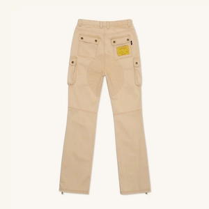 Back view of beige flared cargo pants featuring reinforced stitching and utility pockets