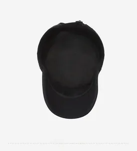 Detailed interior view showing neat stitching and inner lining of the black military flat cap
