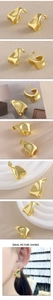 Macro view of 18k gold plated wave earrings with irregular C-shape and glossy finish