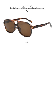 Detail view of tortoiseshell aviator sunglasses with brown lenses and a retro frame