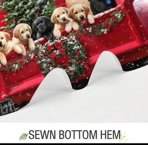 Macro view showing the sturdy sewn bottom hem on the Christmas dog print shower curtain