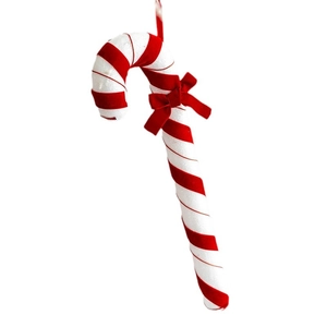 Red and white striped Christmas candy cane ornament with a velvet bow on white background