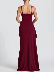 Elegant burgundy backless maxi dress with spaghetti straps and side slit drape detail