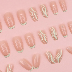 Pink French press-on nails with white wavy patterns and ballet-style nail set