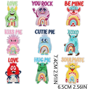 Set of 9 Valentine monster embroidery patches with Love and Hug Me slogans