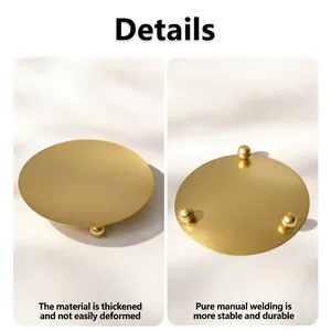 Minimalist gold round metal candle tray with three ball feet for modern home decor