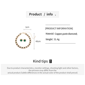 Detailed product card showing green crystal necklace and earrings set with size measurements