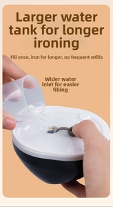 Detail of hand-held garment steamer showing the large water inlet and measuring cup