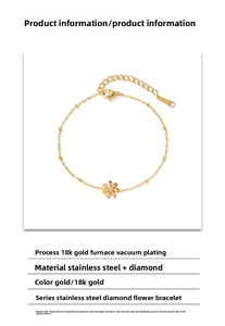 Detail of 18K gold plated stainless steel bracelet with lily of the valley flower charm