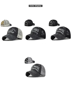Detail of distressed ponytail baseball cap with criss-cross elastic bands for messy bun