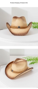Detail of vintage straw cowboy hat with burnished edges and antique silver metal buckle