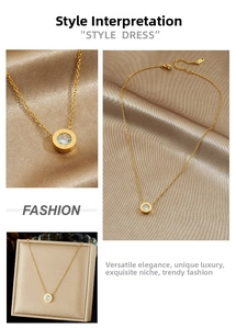 Detail of gold-plated pendant necklace featuring Roman numerals and sparkling cubic zirconia