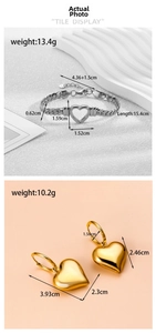 Detail view of heart chain bracelet and golden heart earrings with dimensions